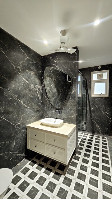 Bathroom in 4 BHK Builder Floor at Auram Floor, South City 2 – for Sale