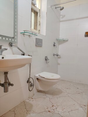 Bathroom in 4 BHK Apartment at Vasant Kunj – for Rent