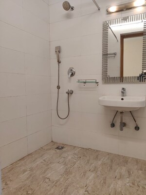 Bathroom in 4 BHK Apartment at Vasant Kunj – for Rent