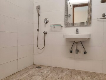 Bathroom in 4 BHK Apartment at Vasant Kunj – for Rent
