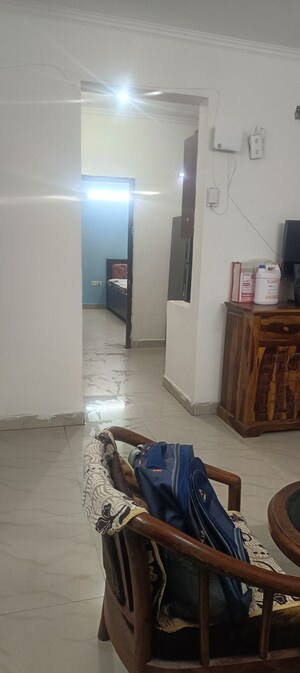 Living Room in 2 BHK Apartment at Antriksh Golf View, Sector 78 – for Rent