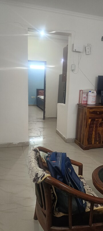 Living Room in 2 BHK Apartment at Antriksh Golf View, Sector 78 – for Rent