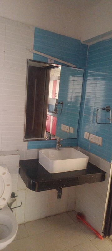 Bathroom in 2 BHK Apartment at Antriksh Golf View, Sector 78 – for Rent