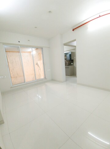 Living Room in 1 BHK Apartment at Unique Ivana, Mira Road – for Sale