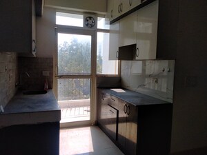 Kitchen in 2 BHK Apartment at Suncity Avenue 76, Sector 76 – for Rent