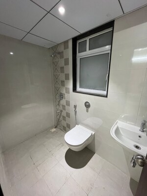 Bathroom in 2 BHK Apartment at Jhamtani Ace Abode, Kiwale – for Sale