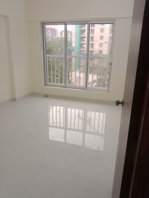 Room in 2 BHK Apartment at Omkara Unchai, Borivali West – for Sale