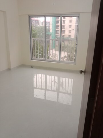 Room in 2 BHK Apartment at Omkara Unchai, Borivali West – for Sale