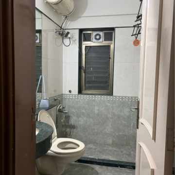 Bathroom in 1.5 BHK Apartment at Amal Aspen Park, Sonawala Industry Estate – for Sale