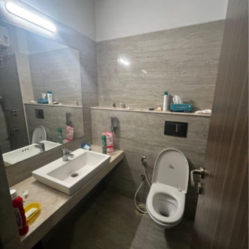 Bathroom in 1.5 BHK Apartment at Amal Aspen Park, Sonawala Industry Estate – for Sale