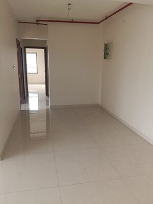 Room in 2 BHK Apartment at Glasswood Om Sarjan CHSL, Borivali West – for Sale