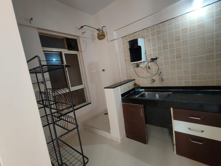 Kitchen, nyati-equatorial-ii 2 Bedroom 1099 Sq.Ft. Apartment In Bavdhan Pune 9517707