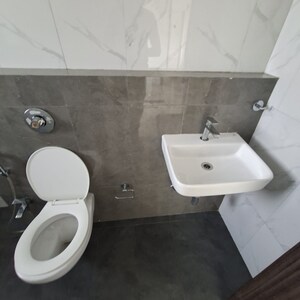 Bathroom in 2 BHK Apartment at Lotus Unity, Versova – for Rent