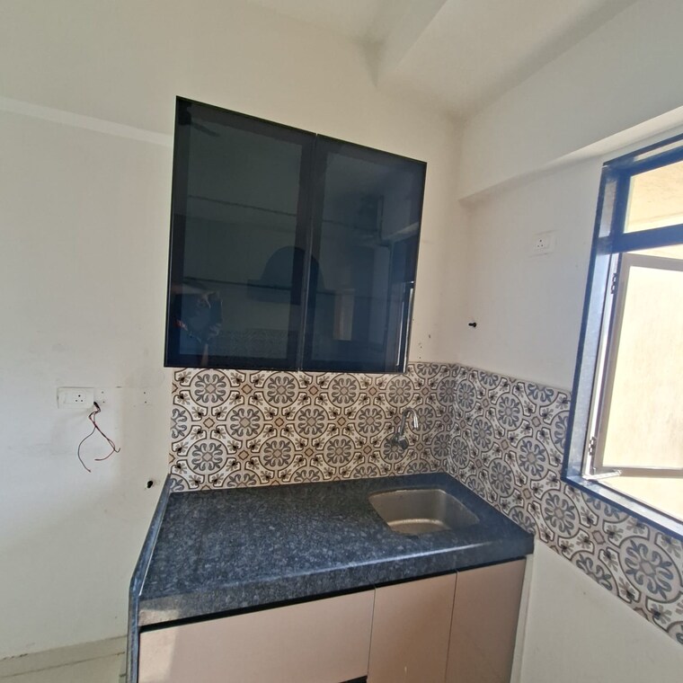 Kitchen, lotus-unity 2 Bedroom 735 Sq.Ft. Apartment In Versova Mumbai 9517718