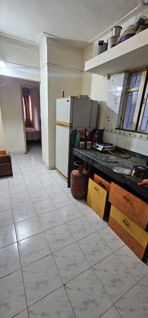 Kitchen in 2 BHK Apartment at Giridhar Chandraneel Apartment, Bavdhan – for Rent