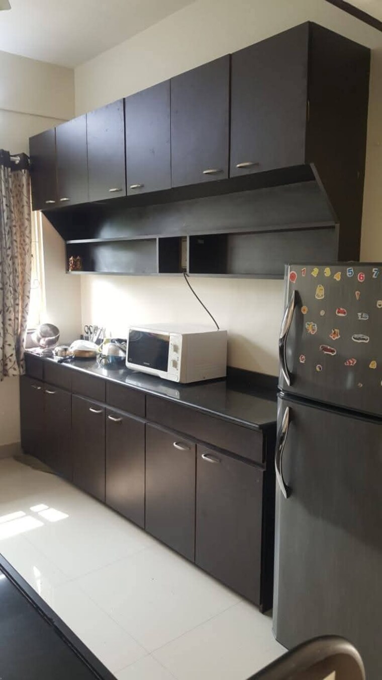 Kitchen, magarpatta-sylvania 3 Bedroom 1600 Sq.Ft. Apartment In Hadapsar Pune 9518236