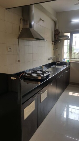 Kitchen in 3 BHK Apartment at Magarpatta Sylvania, Hadapsar – for Sale