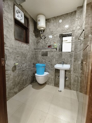Bathroom in 2 BHK Builder Floor at Chattarpur – for Rent