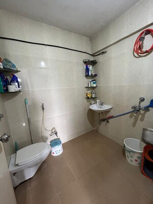 Bathroom in 2 BHK Apartment at Marigold CHS Anand Nagar, Anand Nagar – for Rent