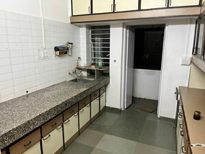 Kitchen in 2 BHK Apartment at Market Yard – for Rent