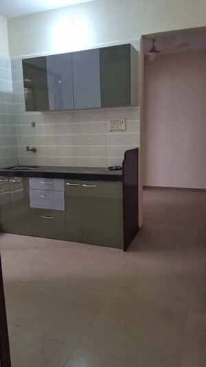 Kitchen in 1 BHK Apartment at Krishna Villa CHS, Ulwe Sector 17 – for Rent