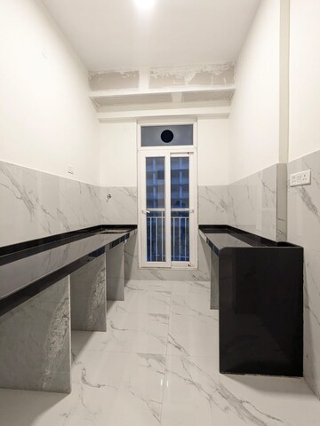 Kitchen in 2 BHK Apartment at Ruparel Sky Green, Kandivali West – for Sale