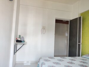 Room in 2 BHK Apartment at Swaran Hans Tower, Morya Nagar – for Sale
