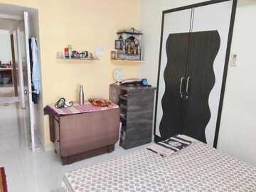 Bedroom in 2 BHK Apartment at Swaran Hans Tower, Morya Nagar – for Sale