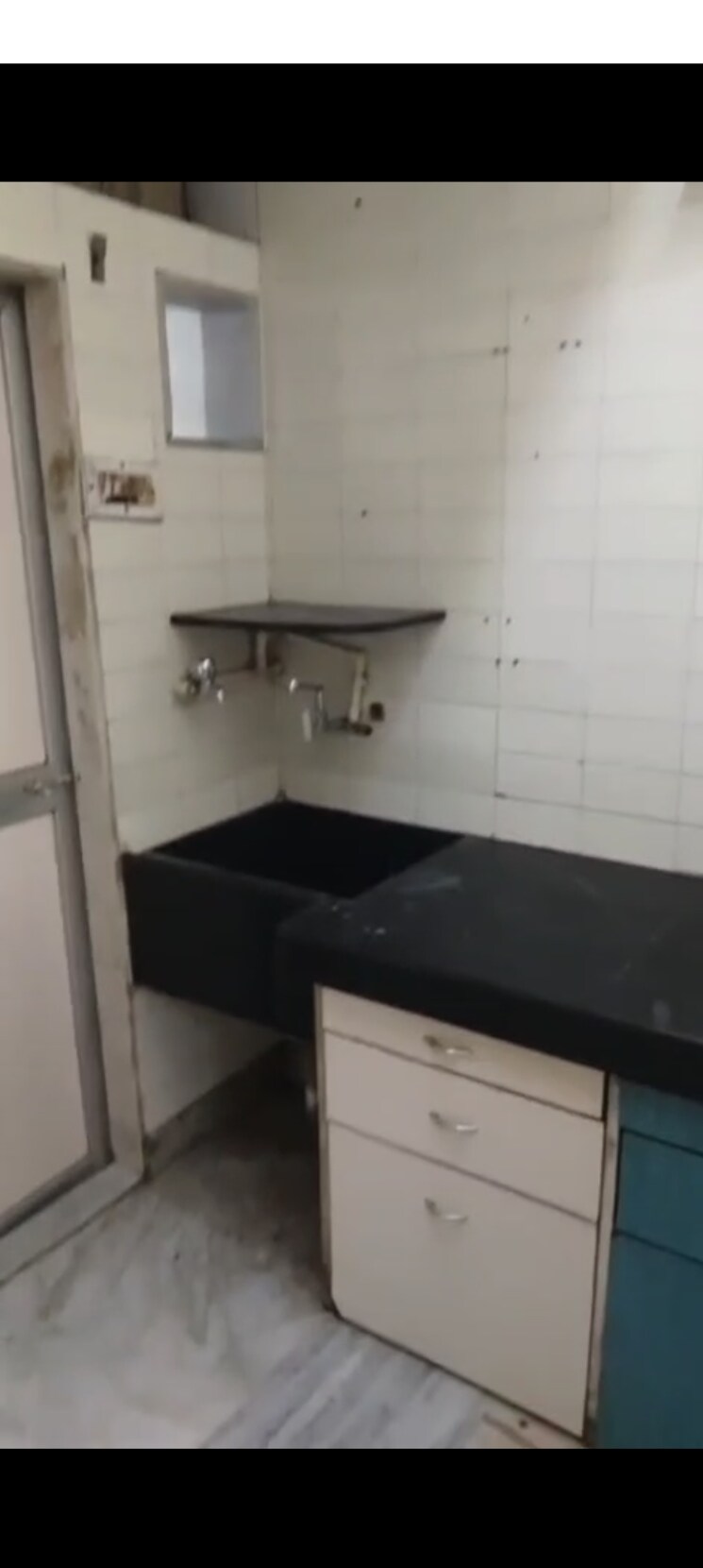 Kitchen, assumption-view 1.5 Bedroom 450 Sq.Ft. Apartment In Kandivali West Mumbai 9519485