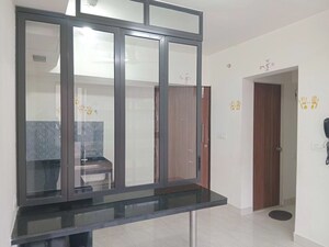 Living Room in 1 BHK Apartment at Lodha Crown Quality Homes, Majiwada – for Rent