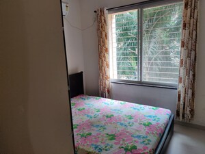 Bedroom in 2 BHK Apartment at NSG Royal One, Pimple Nilakh – for Rent