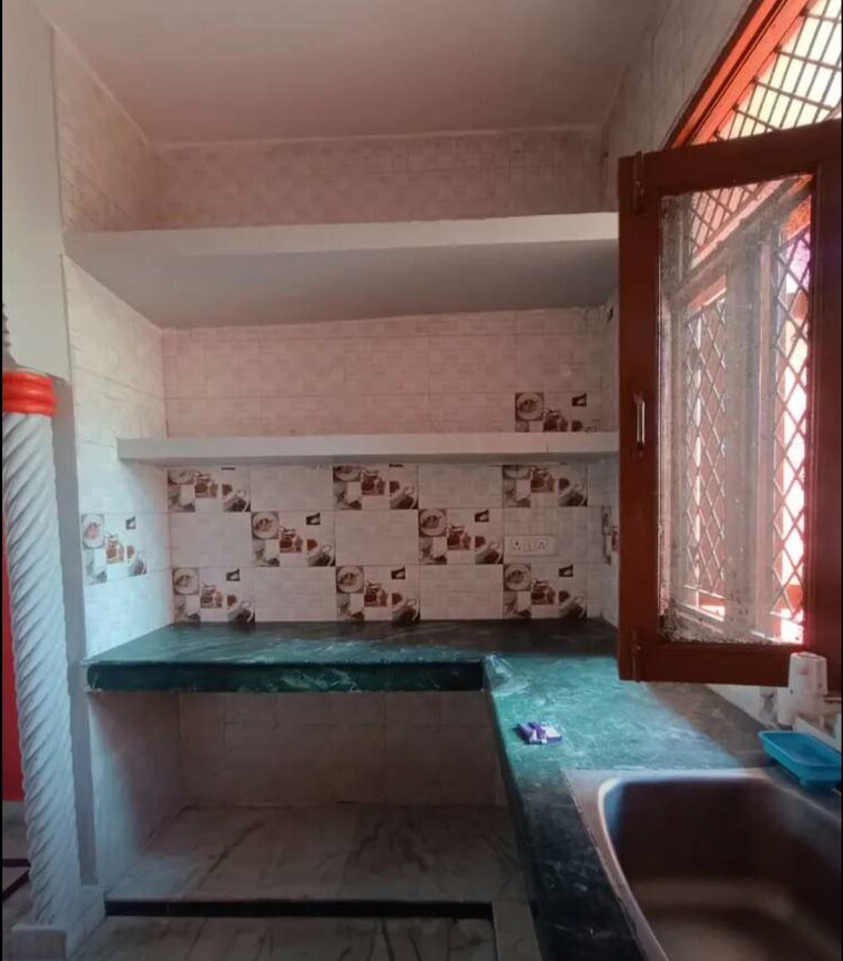 Kitchen, alpha ii greater noida 1.5 Bedroom 600 Sq.Ft. Independent House In Alpha Ii Greater Noida Greater Noida 9519873