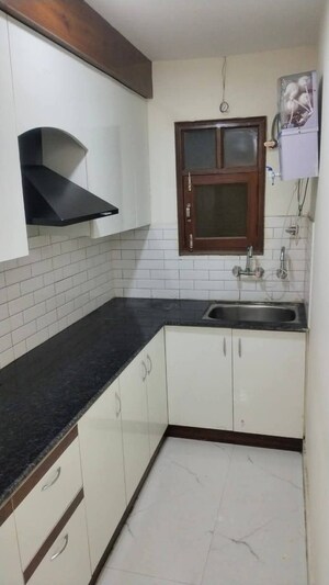 Kitchen in 2 BHK Builder Floor at Chattarpur – for Rent