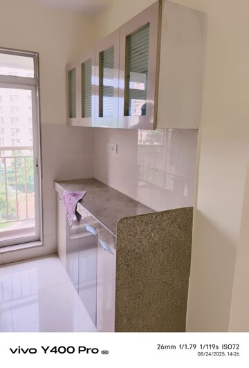 Kitchen in 1 BHK Apartment at Metropolis Aquaris Phase 1, Kasarvadavali – for Sale