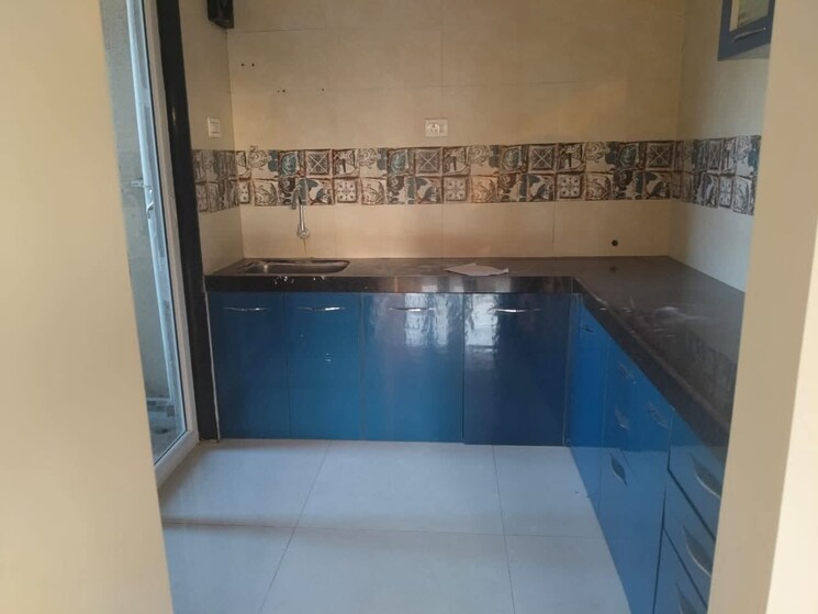 Kitchen, proviso-leisure-town 2 Bedroom 1050 Sq.Ft. Apartment In Hadapsar Pune 9520525