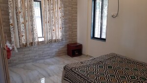 Bedroom in 1 BHK Apartment at Garden Estate CHS, Ganeshwadi – for Rent