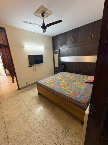 Bedroom in 2 BHK Builder Floor at Kalkaji – for Rent