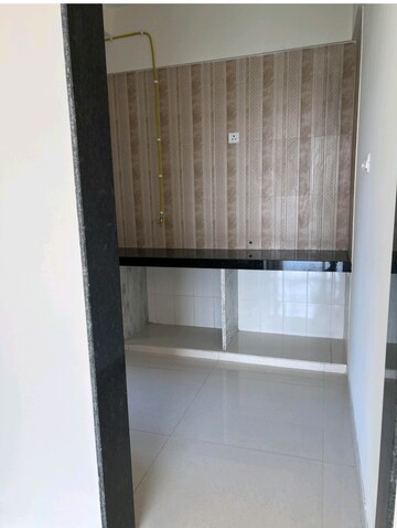 Kitchen in 2 BHK Apartment at Sheth Zuri, Laxmi Nagar – for Rent