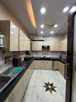 Kitchen in 4 BHK Builder Floor at Shivalik Colony – for Sale