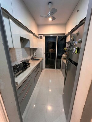 Kitchen in 2 BHK Apartment at Courtyard by Narang Realty and The Wadhwa Group, Pokhran Road No Two – for Rent