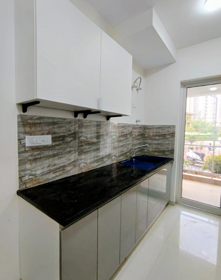 Kitchen, shapoorji-pallonji-joyville-gurgaon 2 Bedroom 915 Sq.Ft. Apartment In Sector 102 Gurgaon 9520803