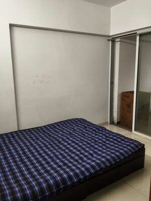Bedroom in 2 BHK Apartment at Satyam Shivam Phase 2, Kharadi – for Rent