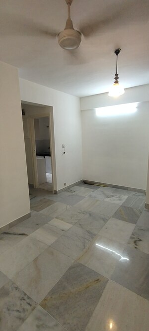 Living Room in 1 BHK Apartment at Hiranandani Gardens Canna, Powai – for Rent