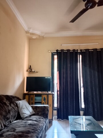 Living Room in 2 BHK Apartment at Eden Garden CHS, Viman Nagar – for Rent