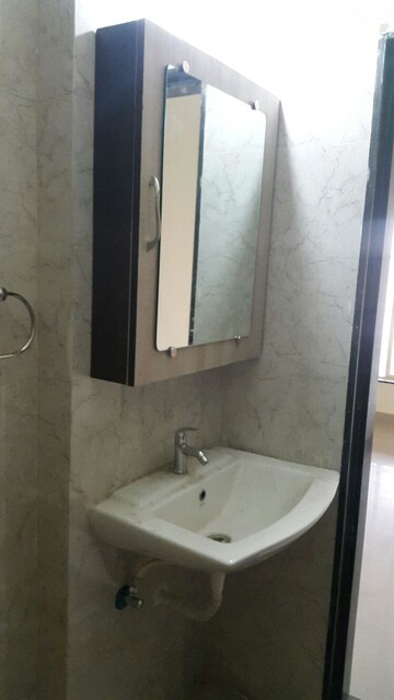 Bathroom in 2 BHK Apartment at Mittal Arcvista, Dhanori – for Rent