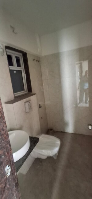 Bathroom in 2 BHK Apartment at VKG Beverly Hills, Andheri East – for Rent
