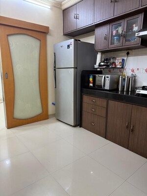 Kitchen in 2 BHK Apartment at New Jay Palace, Yari Road – for Rent