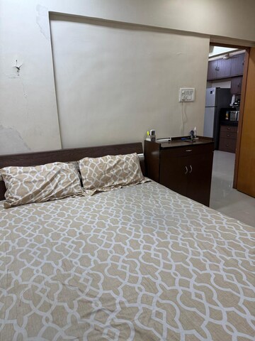 Bedroom in 2 BHK Apartment at New Jay Palace, Yari Road – for Rent