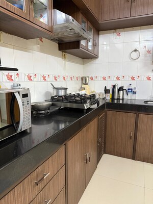 Kitchen in 2 BHK Apartment at New Jay Palace, Yari Road – for Rent