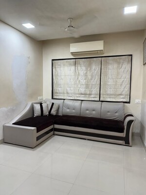 Bedroom in 2 BHK Apartment at New Jay Palace, Yari Road – for Rent